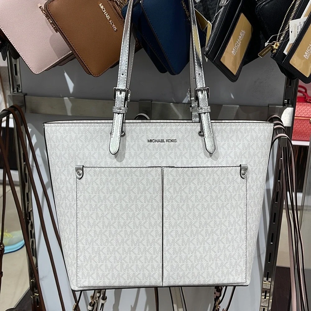 MICHAEL KORS OUTLET
Jet Set Medium Logo Pocket Tote Bag
Optic White/Silver 
NWT - Picture 13 of 16
